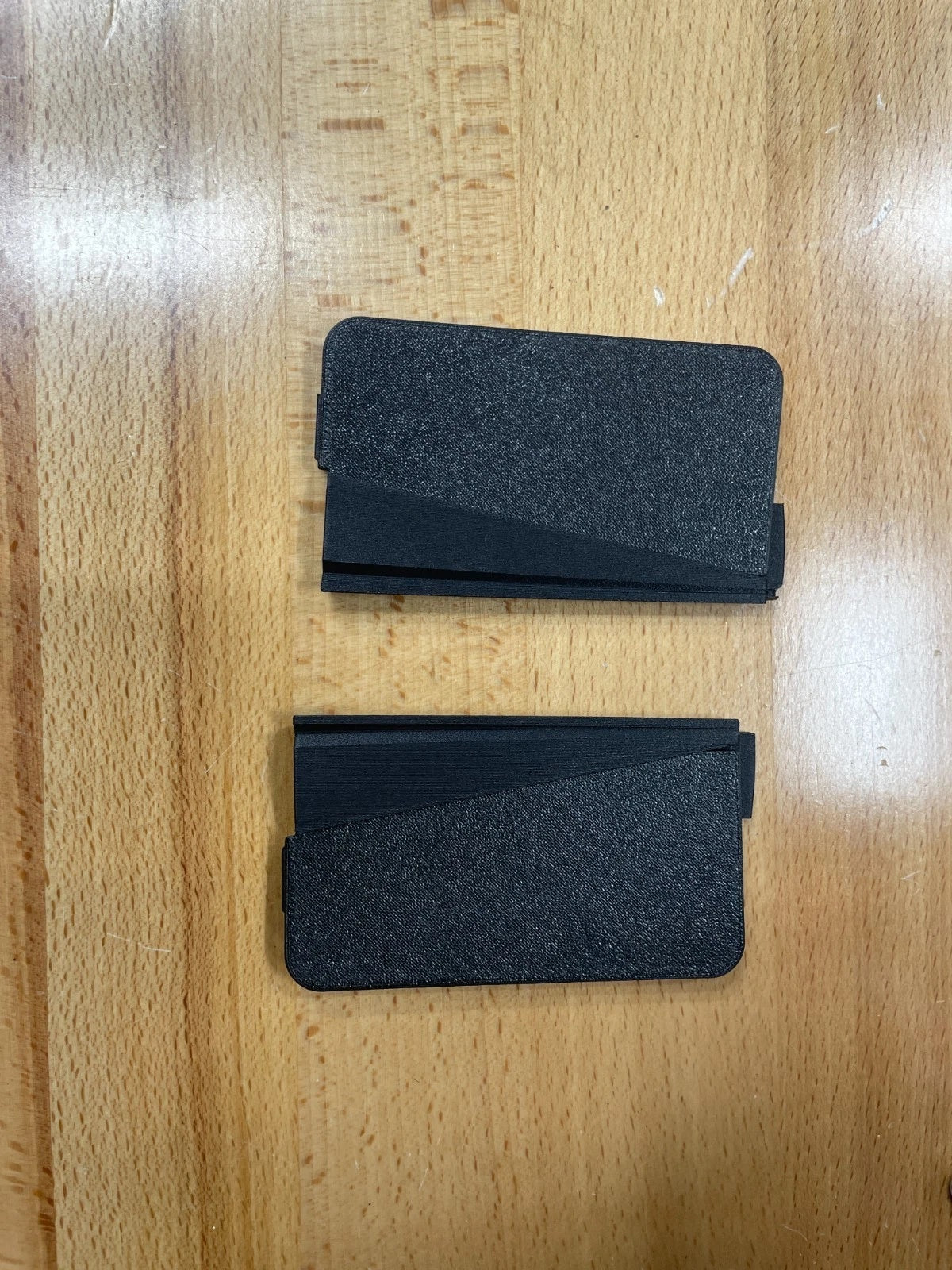 Cybertruck side mirror delete covers pair on wood